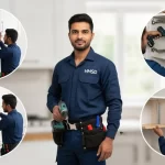 A carpenter is standing in modern kitchen with tools and fittings around, representing complete kitchen cabinet shelf installation services in Dubai.